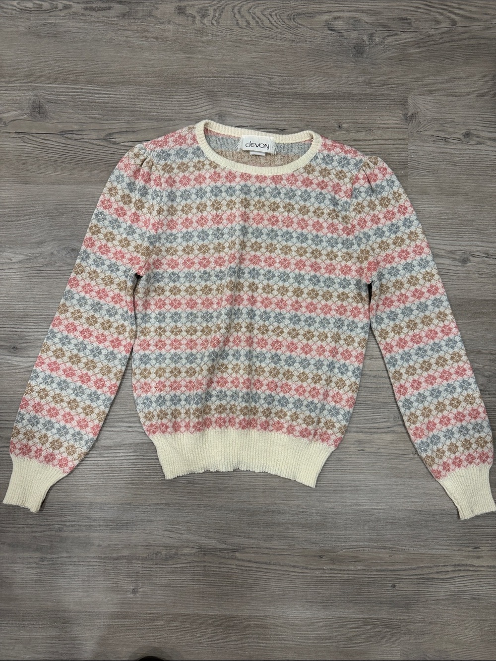 Vintage Devon brand sweater features a cream-colored knit